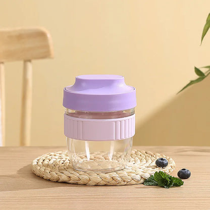 Green PP plastic salad cup with attached lid and spoon on a white background.