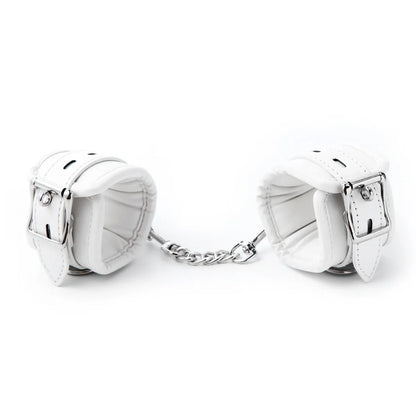 White PU sponge bondage set showing handcuffs, footcuffs and neck cuff for comfortable restraint