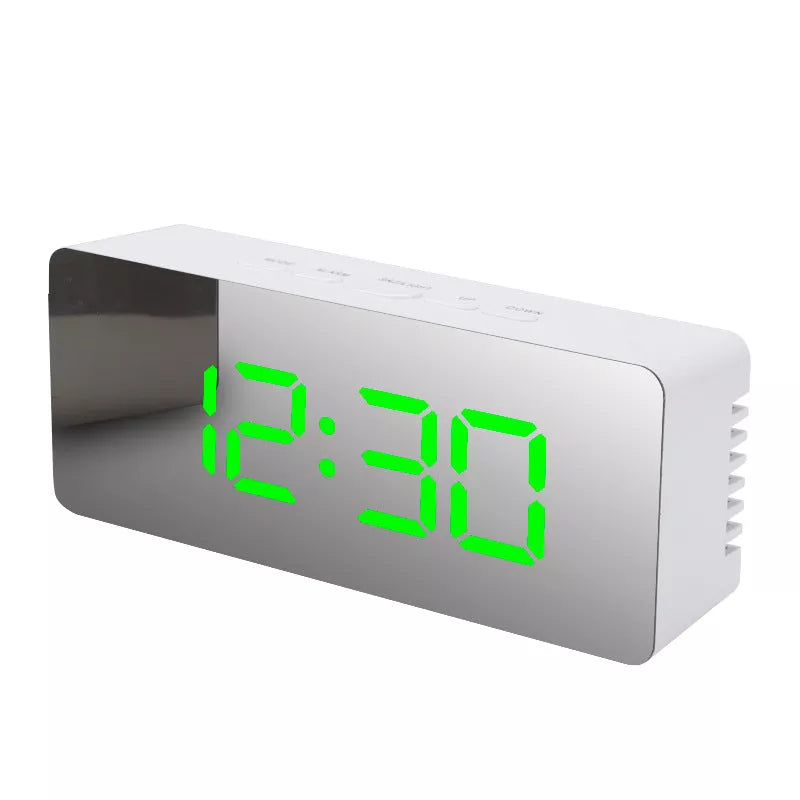 LED Digital Mirror Alarm Clock with customizable light colors on a desktop