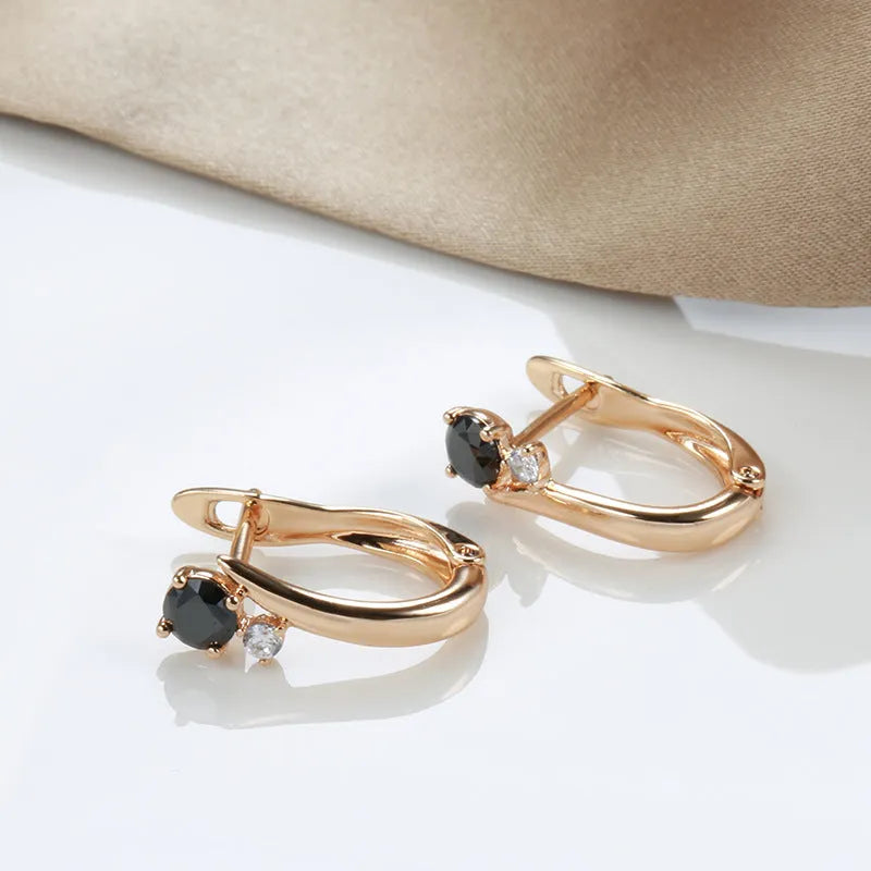 Gold geometric drop earrings with black agate gemstone inlay and retro styling