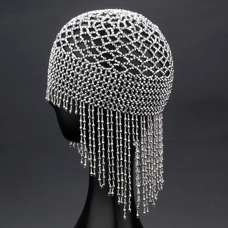 Silver and black belly dance hat with handmade beading and long tassels for performance hair ornamentation