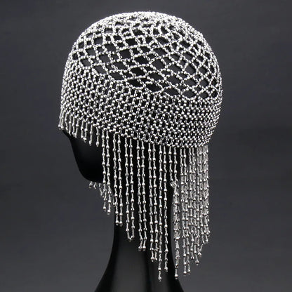 Silver and black belly dance hat with handmade beading and long tassels for performance hair ornamentation