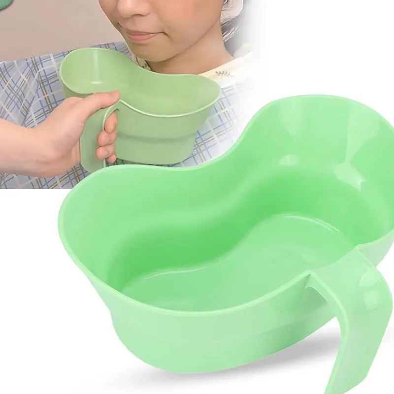 Green plastic gargle cup for bedridden elderly oral care showing modern simplicity design