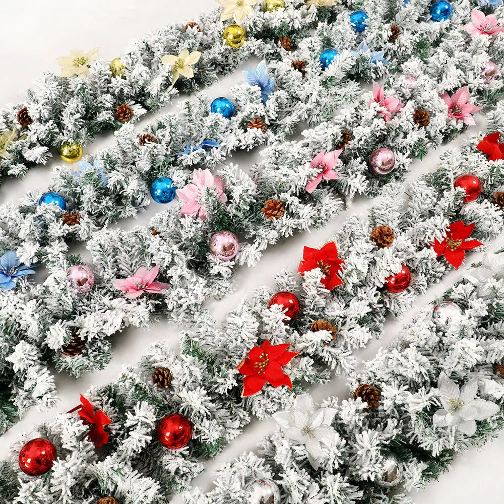 PVC Christmas rattan garland with flocked decoration in golden colour, draped as a festive vine.