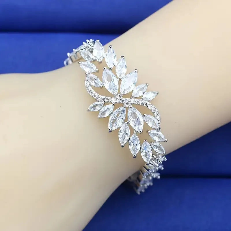 Gold-electroplated copper bracelet with colour zircon stones and ice flower decorative elements