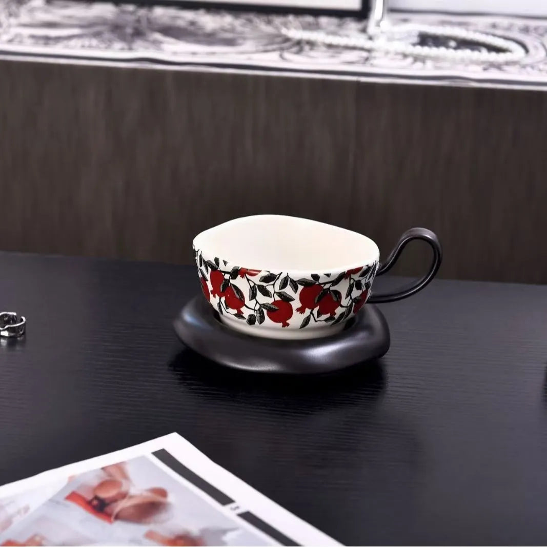 Antique-style ceramic coffee cup and saucer set with 210ml capacity in black or orange medieval designs
