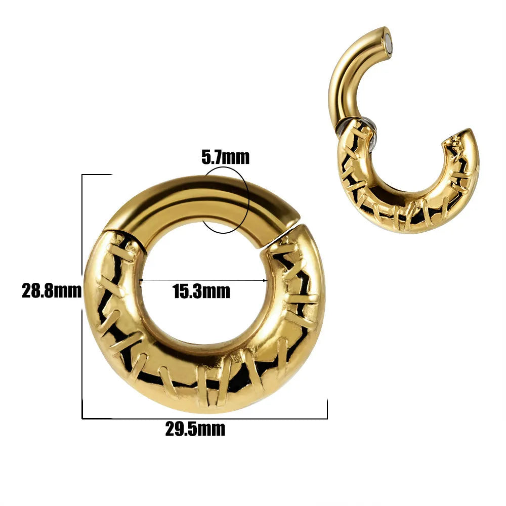 A pair of stainless steel fashion earrings featuring a totem pattern design in an electroplated colour.