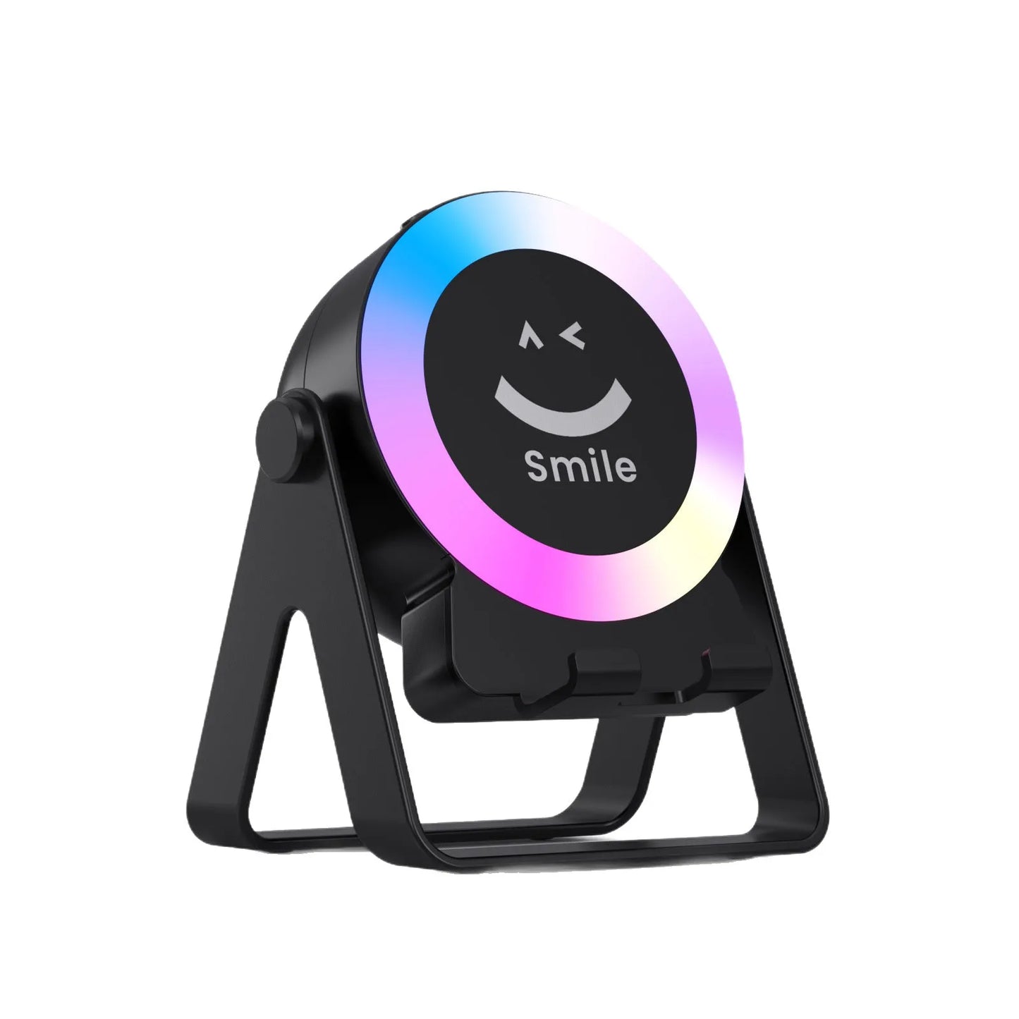 Black and white wireless induction charging Bluetooth speaker with colourful LED lights on a desk.