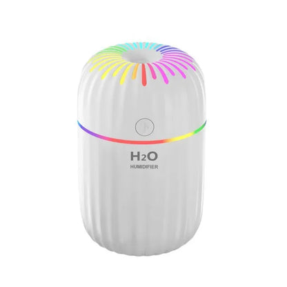 Mini USB aromatherapy humidifier in green, pink or white with 75x75x116mm dimensions and 0.5L water tank
