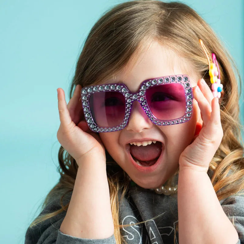 Plastic sunglasses in various colour combinations for sun protection during travel and cycling