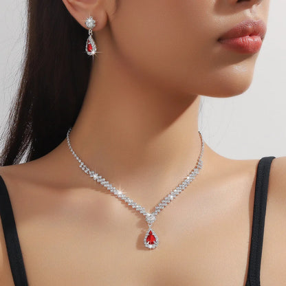 Rhinestone claw chain necklace and earrings set with water drop shaped pendants
