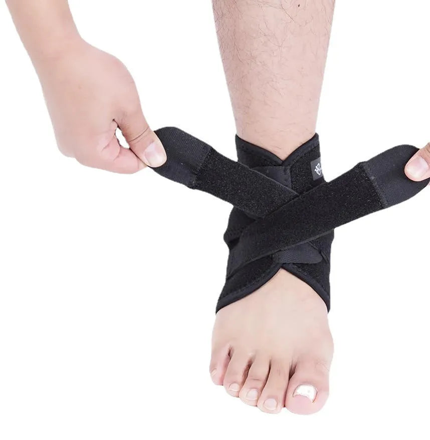 A single black sports ankle support laid flat, designed for injury protection during various athletic activities.