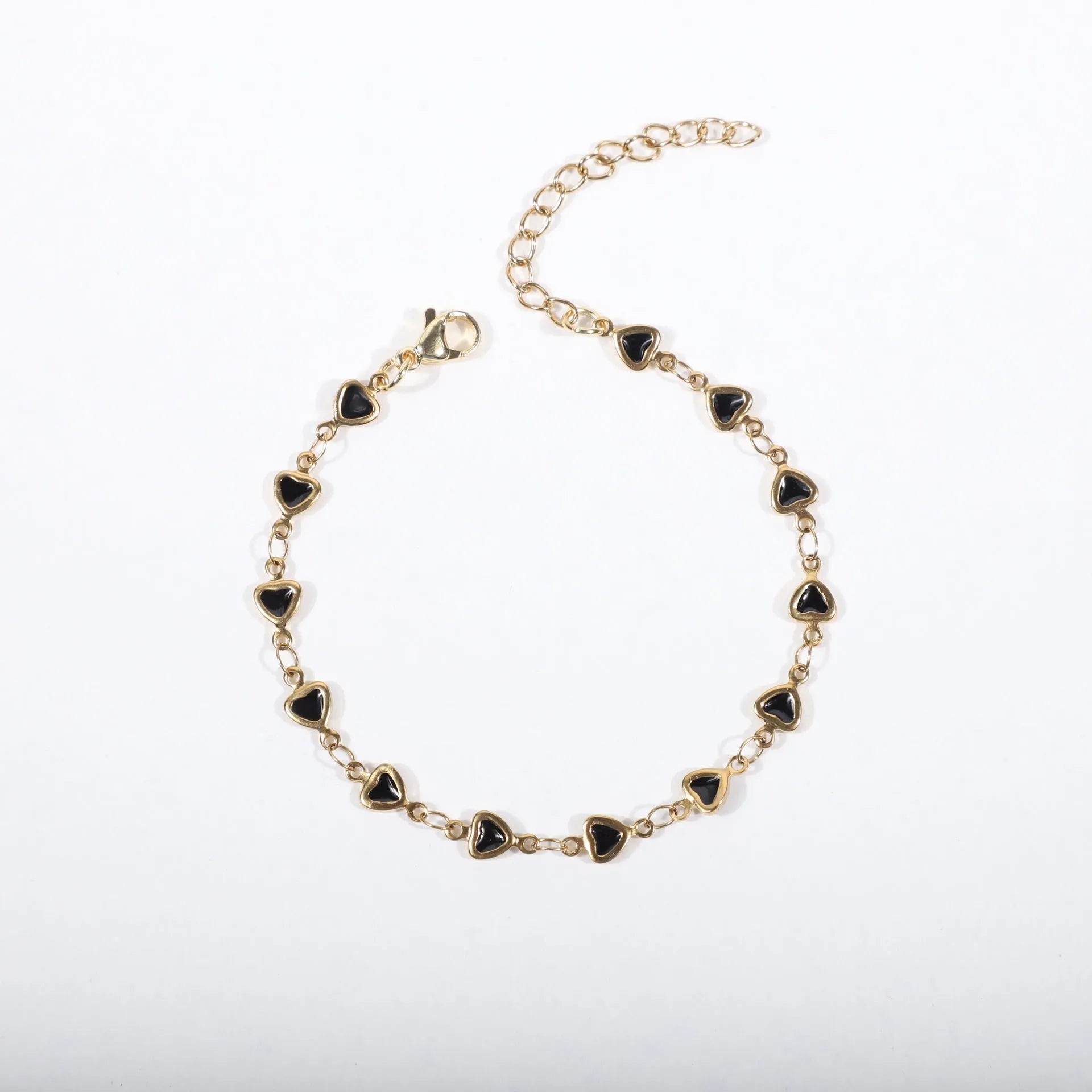 Stainless steel heart bracelet with 18K gold plating in multiple colours showing adjustable 17+5cm length