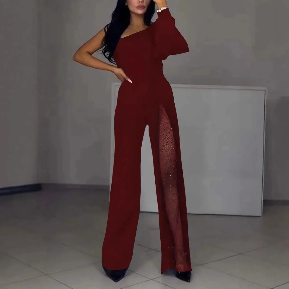 Women's polyester jumpsuit with oblique shoulder and high slit in black, wine red, white, or dark blue
