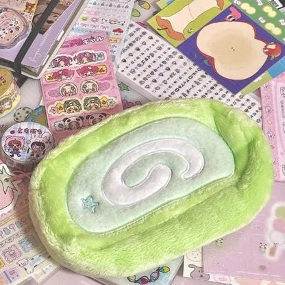 Honeydew Roll plush velvet pencil case with Swiss roll cake design, measuring 20cm in length
