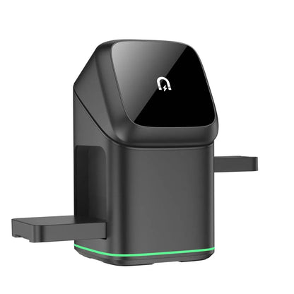 Black magnetic wireless phone charging stand on a desk, rotated to a landscape viewing angle.