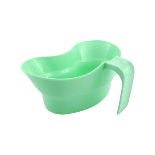 Green plastic gargle cup for bedridden elderly oral care showing modern simplicity design
