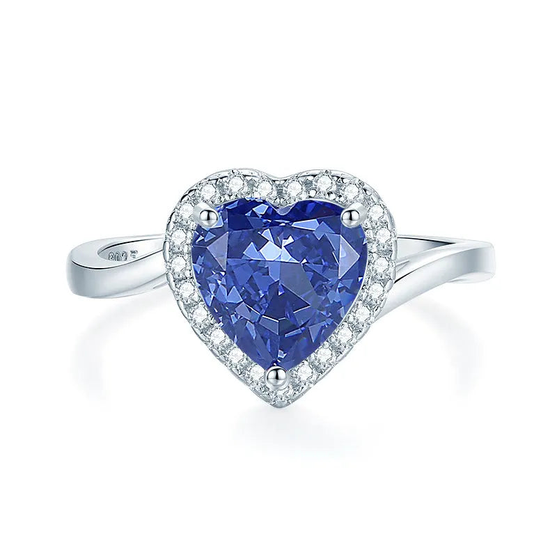Heart-shaped sterling silver ring with zircon stone in ice flower cut, showing 1.5 cm width and 1.8 cm height dimensions