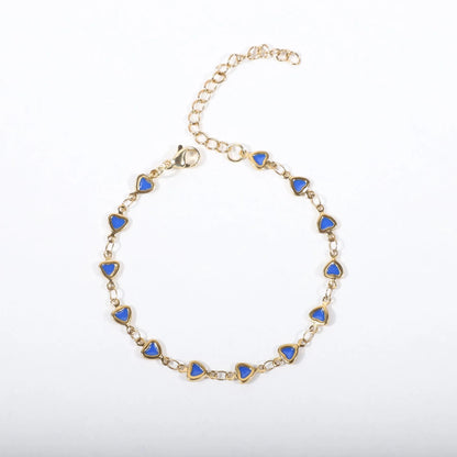 Stainless steel heart bracelet with 18K gold plating in multiple colours showing adjustable 17+5cm length