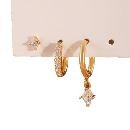 Geometric zircon earring three-piece set for ladies in gold and silver tones.