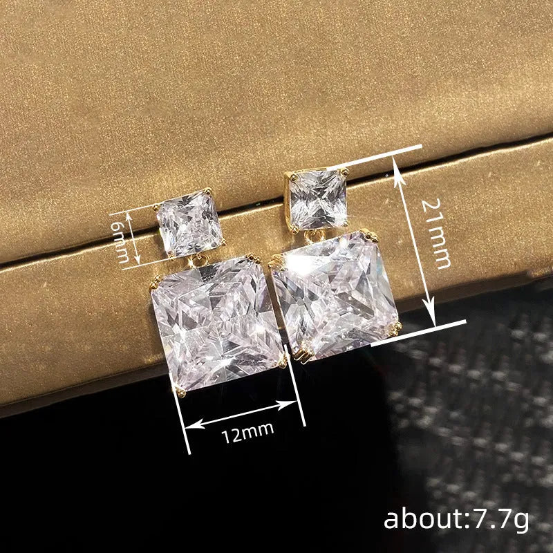 Geometric square copper earrings in white gold or gold colour with quadrilateral design for women