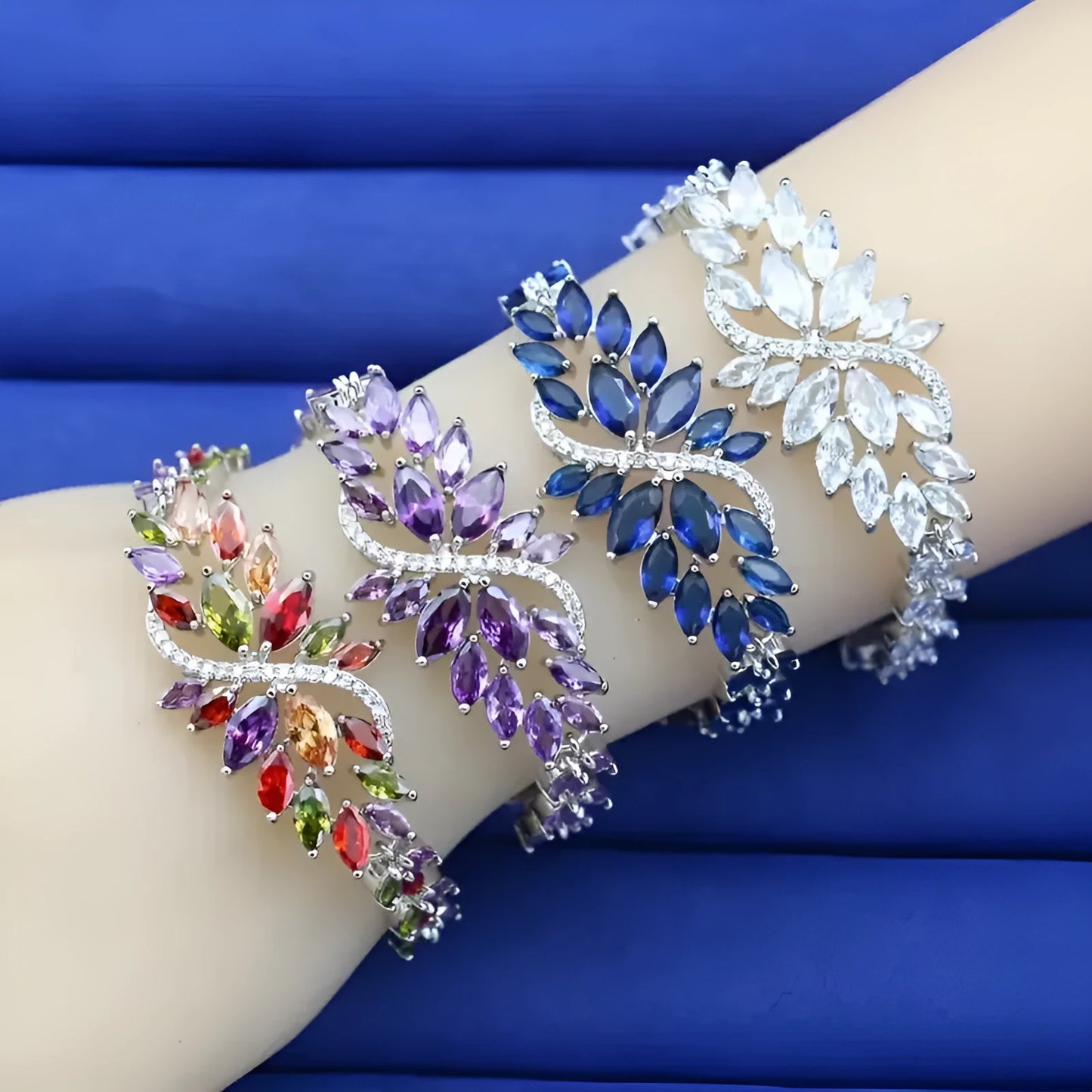 Gold-electroplated copper bracelet with colour zircon stones and ice flower decorative elements