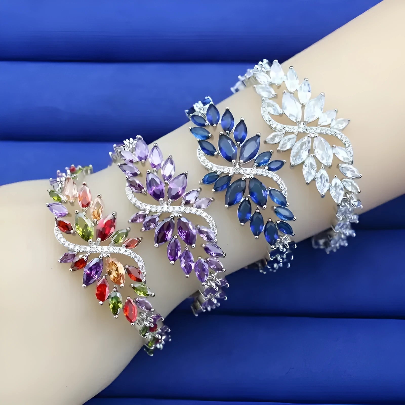 Gold-electroplated copper bracelet with colour zircon stones and ice flower decorative elements