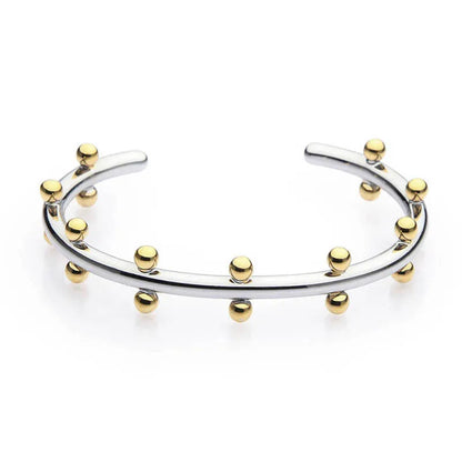 C-shaped stainless steel bracelet with textured rivets and bean beads in gold finish