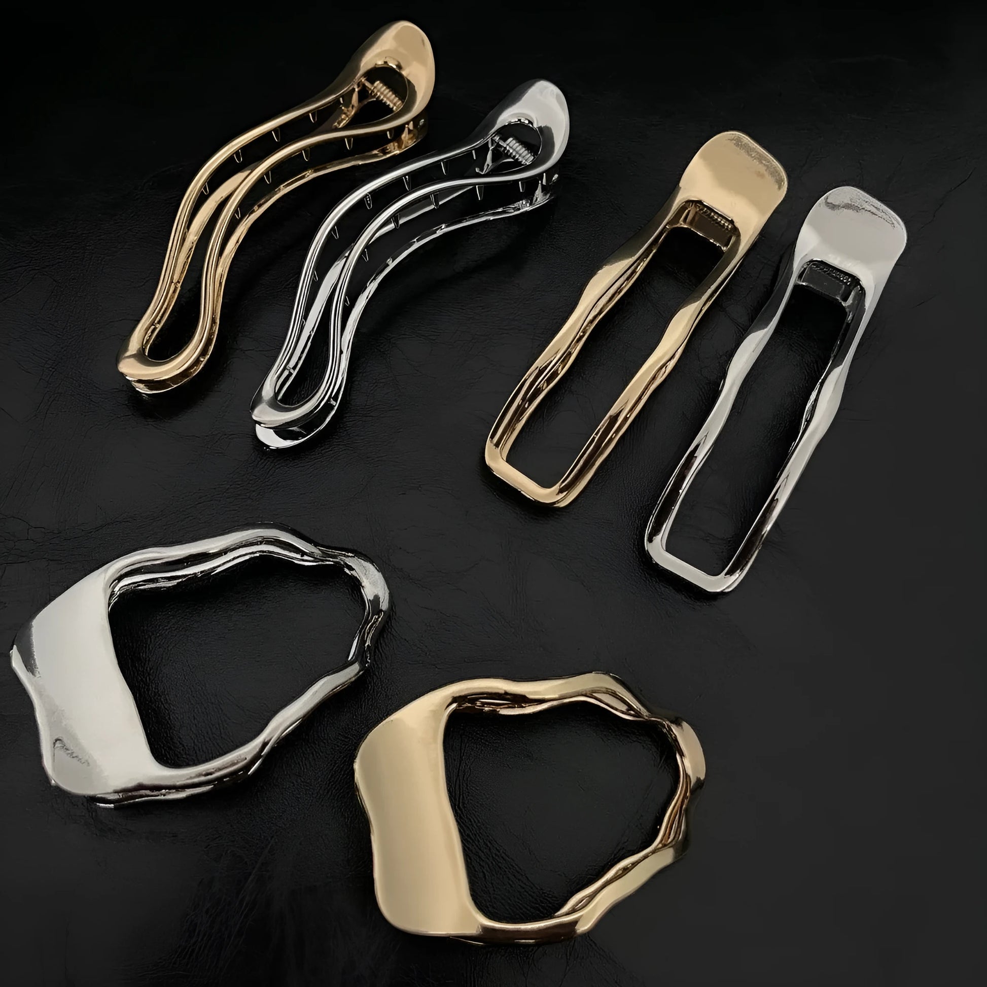 Women's gold and silver zinc alloy hair barrettes in arc, square, and triangle shapes.