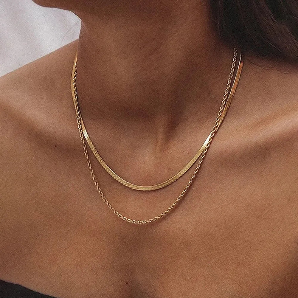 Women's adjustable double-layer twist necklace with titanium steel geometric pendant on snake bones chain, showing 21-50cm length range