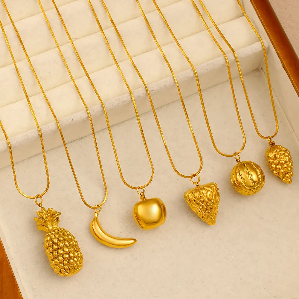 Stainless steel fruit necklace pendant with six design options including apple, grape, watermelon shapes on 40-45cm chain
