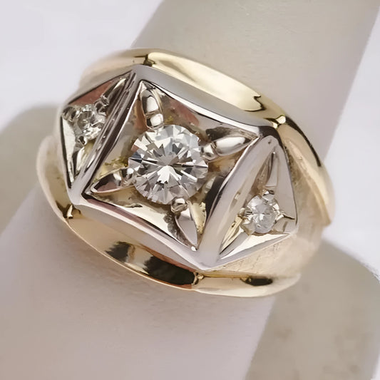 Gold geometric hollow wide band couple's ring showing chamfered square pattern detail on a solid copper band.