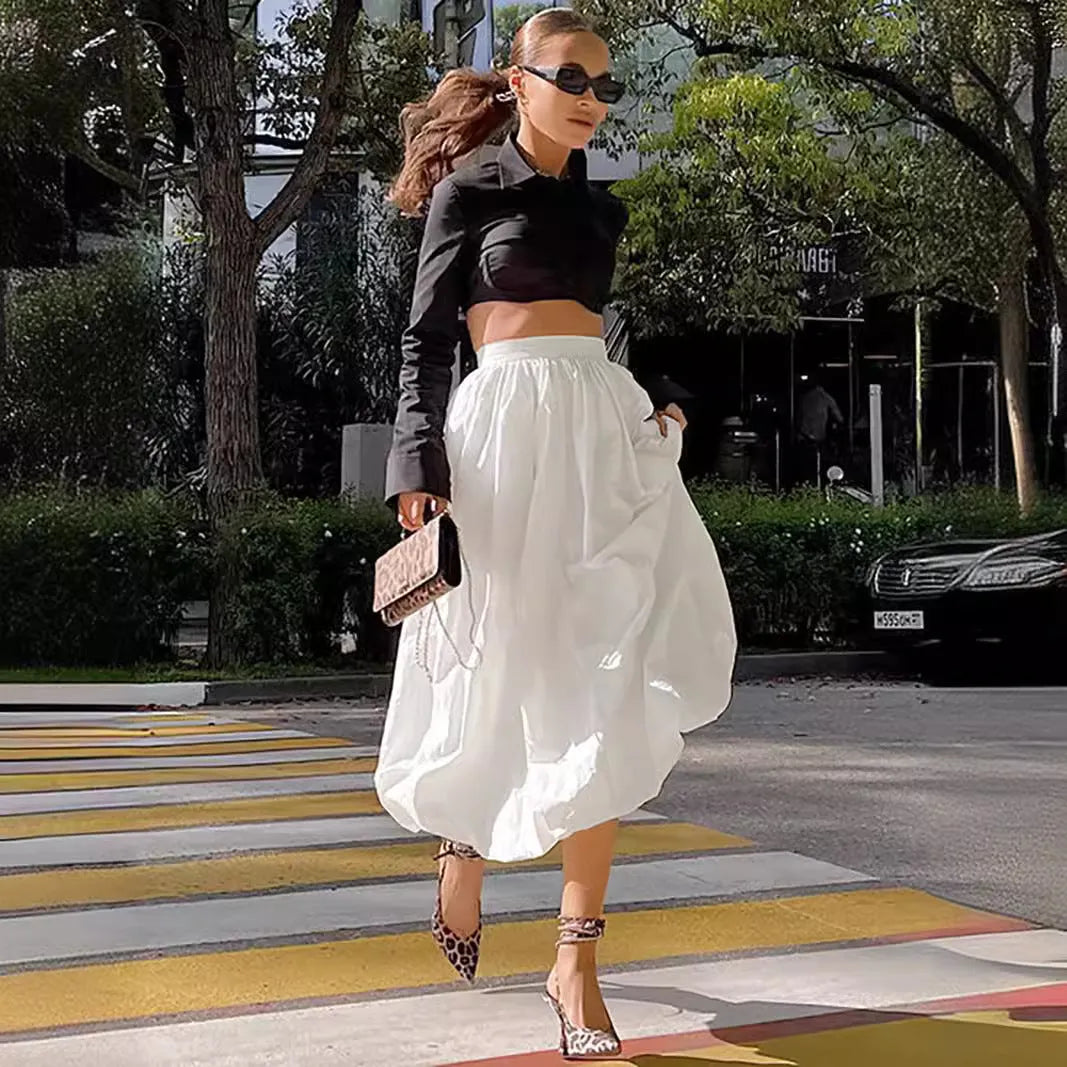 Women's solid colour cotton long A-line skirt in black or white temperament commute style