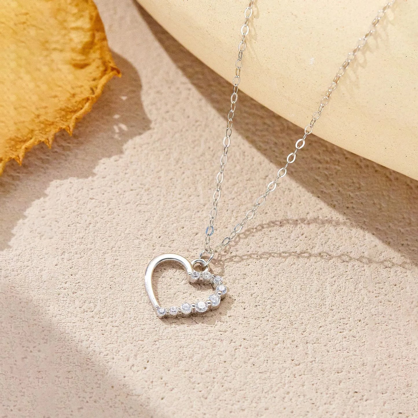 S925 sterling silver hollow heart pendant necklace on a regular chain with gold-plated finish options
