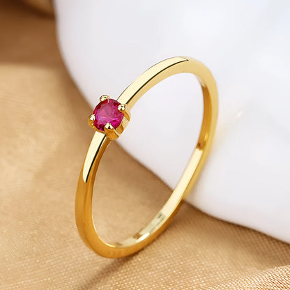 Twin Style copper geometric circle ring with a single diamond, shown in blue, green, red, or white.