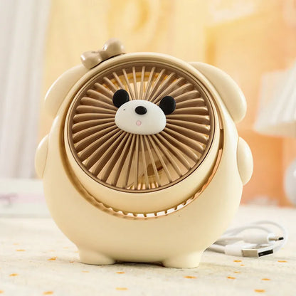 USB desktop fan with dog design showing three speed buttons and USB port, placed on a desk.