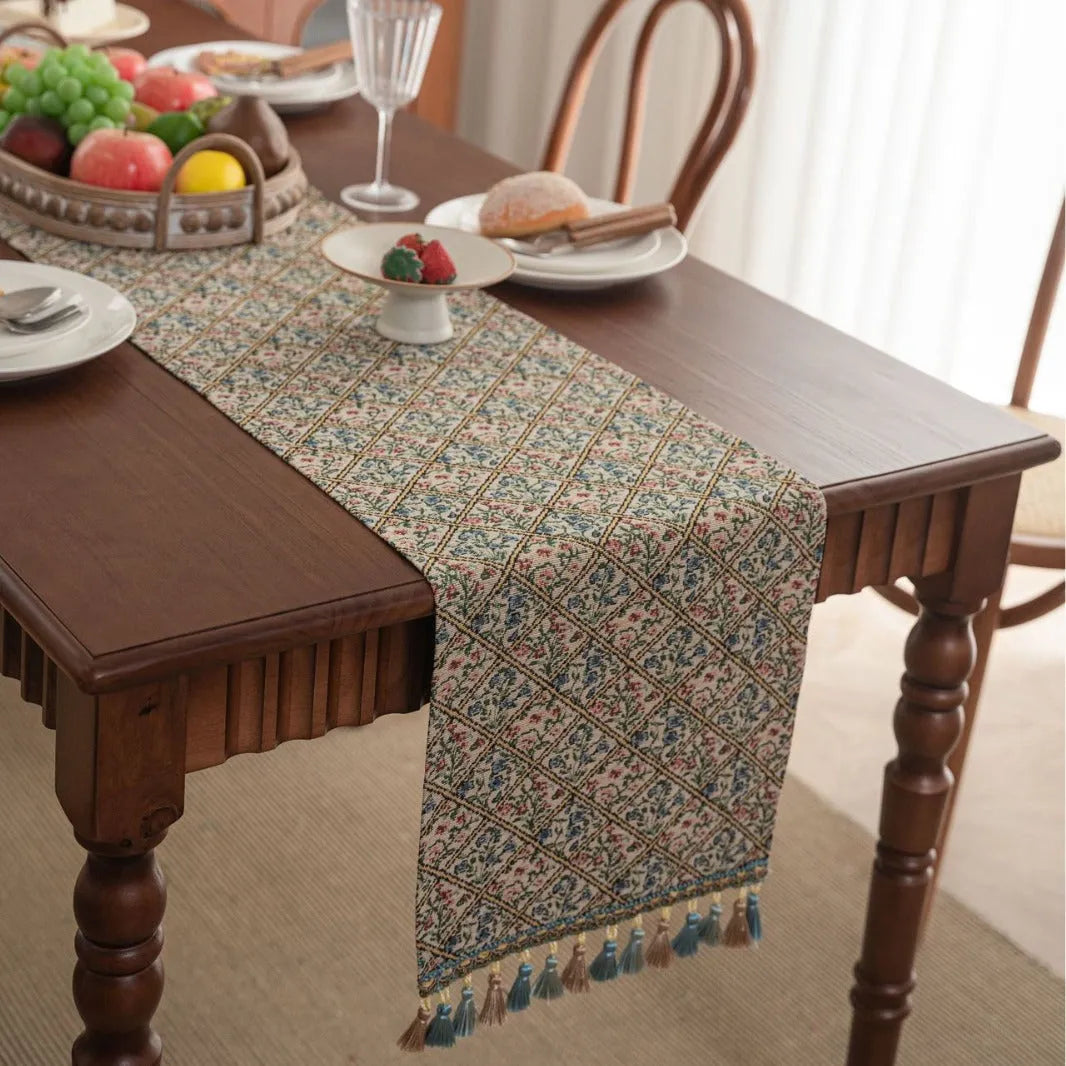 Dark blue jacquard stripe table flag with tassel trim, 32cm wide, showing textured weave pattern