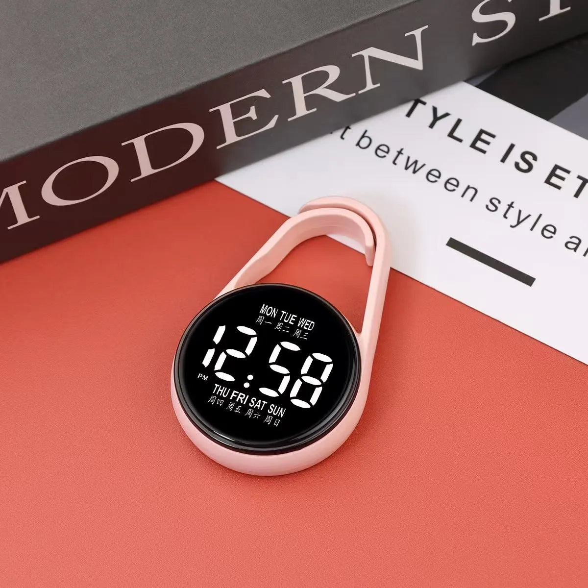 Mini digital LED electronic watch with plastic strap in various colours like fluorescent green and black on display.