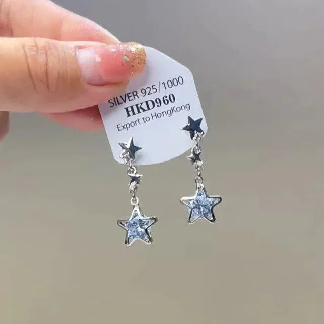 Geometric star-shaped alloy ear clip with rhinestones and hanging tassels for women