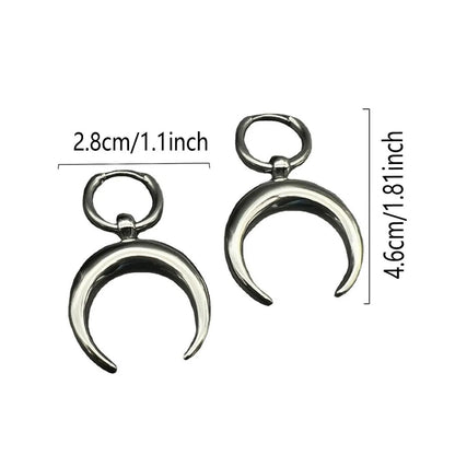 Silver big hoop earrings with a gothic moon and geometric punk design, ear clip style.