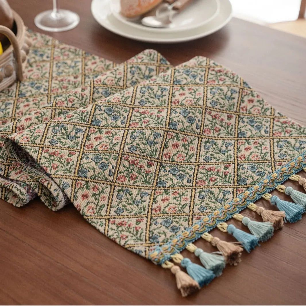 Dark blue jacquard stripe table flag with tassel trim, 32cm wide, showing textured weave pattern
