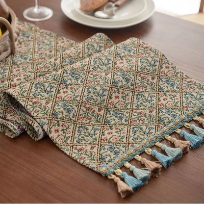 Dark blue jacquard stripe table flag with tassel trim, 32cm wide, showing textured weave pattern