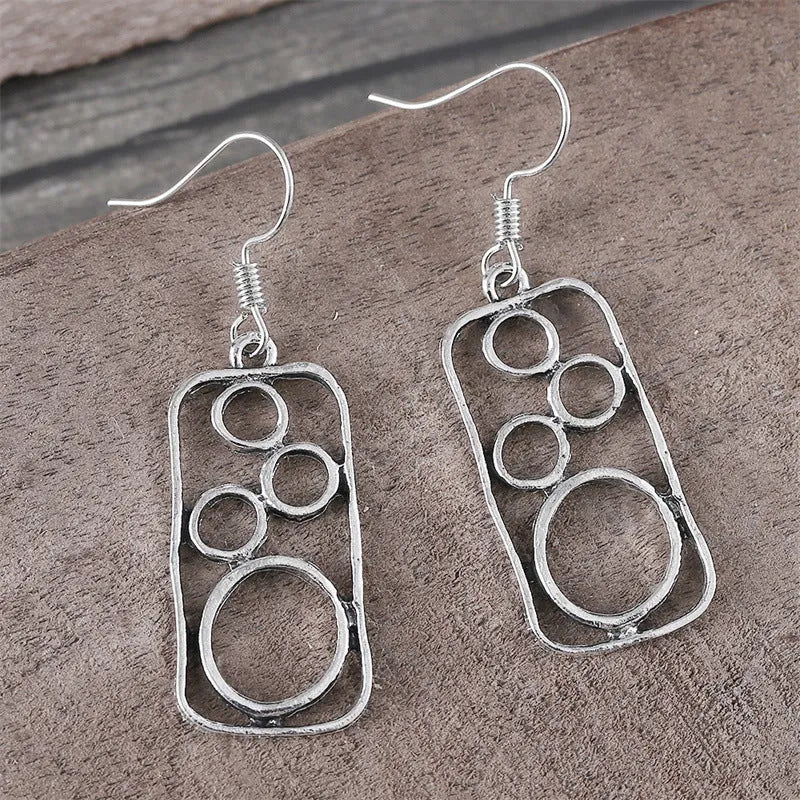 Antique silver zinc alloy round ring earrings with irregular geometric square design