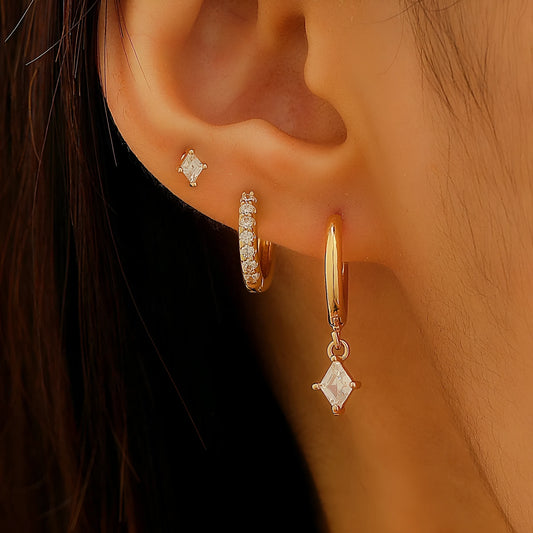Geometric zircon earring three-piece set for ladies in gold and silver tones.