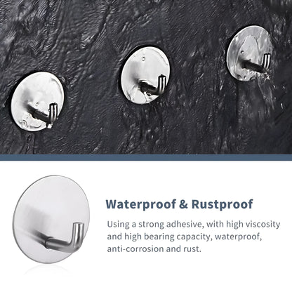Two round stainless steel self-adhesive hooks, one black and one polished, for no-drill bathroom and kitchen hanging.