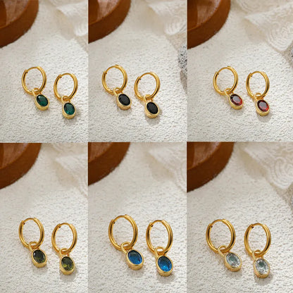 Women's copper oval earrings in six colour options showing elliptical 1.5cm retro design