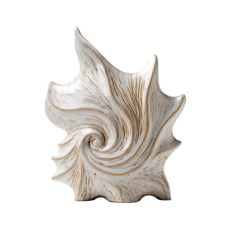 French art ceramic vase with coloured glaze in a European retro style, shown empty on a wooden surface.
