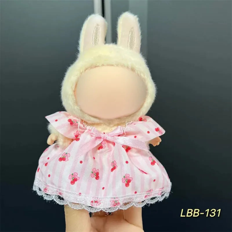 Plastic costume for 17cm vinyl doll in style LBB100 with size chart for fit guidance