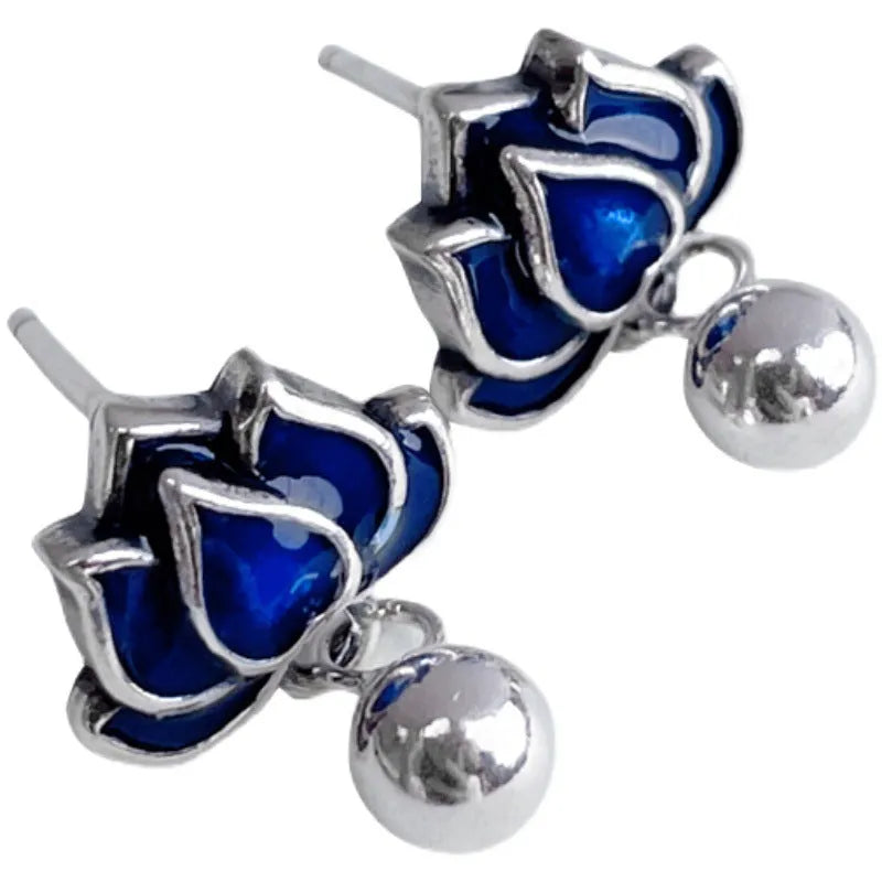 Blue Lotus Earrings with 1.2cm width lotus flower design and seedpod tassel detail