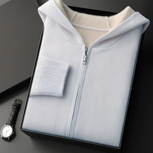 Man's dark blue zip-up cashmere cardigan with a half-high collar, shown on a hanger.